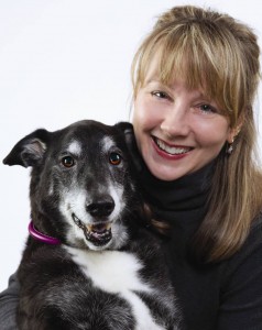 a photo of Boo the dog and trainer Lisa J. Edwards
